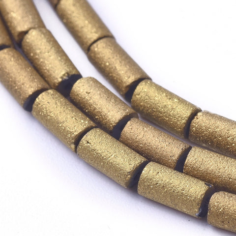 Electroplated gold glass bead