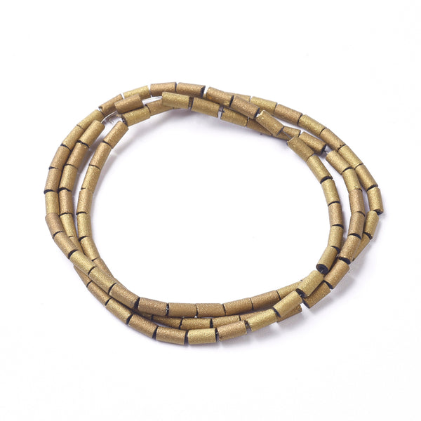 Electroplated gold glass bead