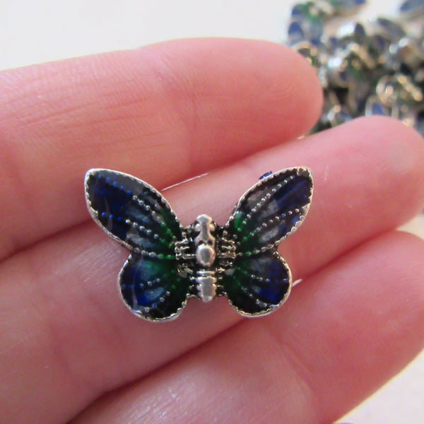 tess-array.com, butterfly for mosaic art, wire withblue green enamel, so pretty, fly away home....