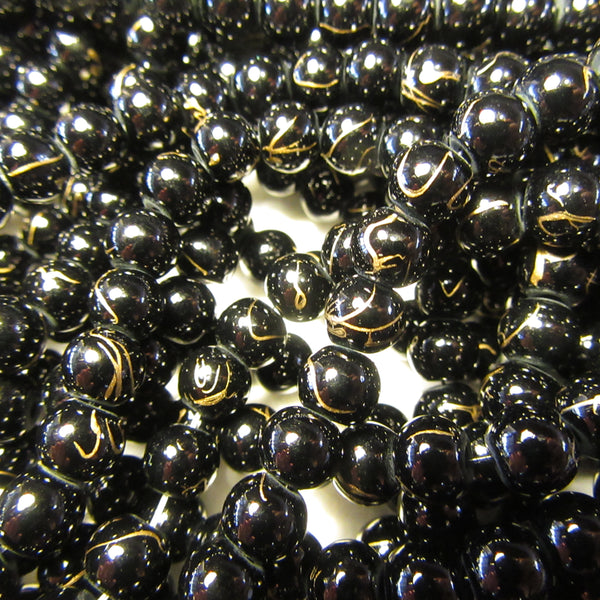 Black glass beads with Gold Vein