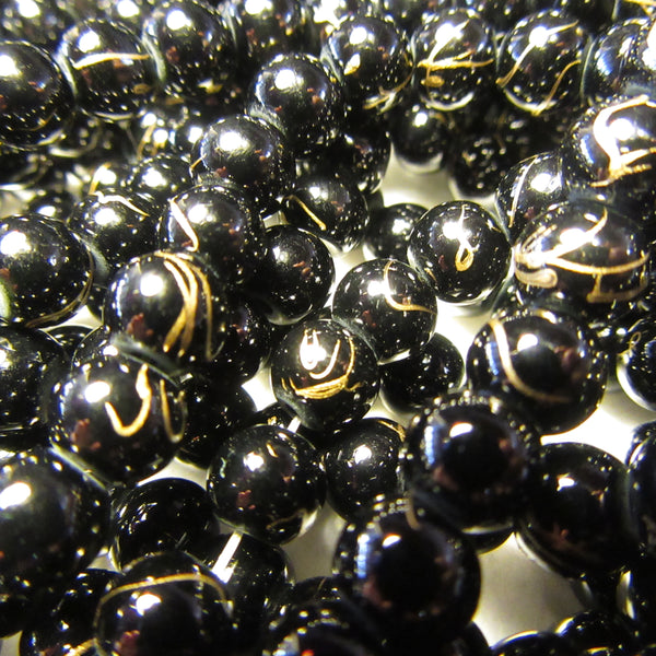 Black glass beads with Gold Vein