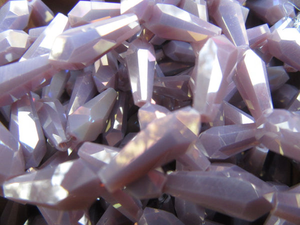 Mauve faceted glass beads